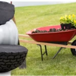 Cross section of flat free tire to show solid tire all the way through next to usage example of a flat free tire on a wheel barrow